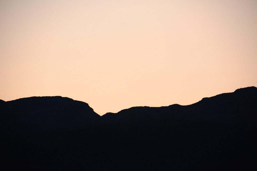 Close up photos of a hilly horizon at sunset